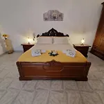 Casa Marcel Удженто