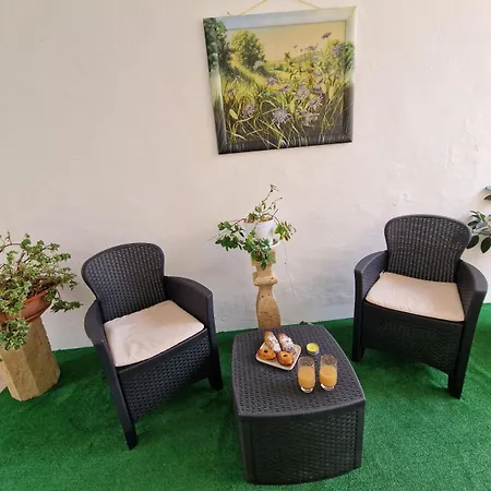 Casa Marcel Удженто